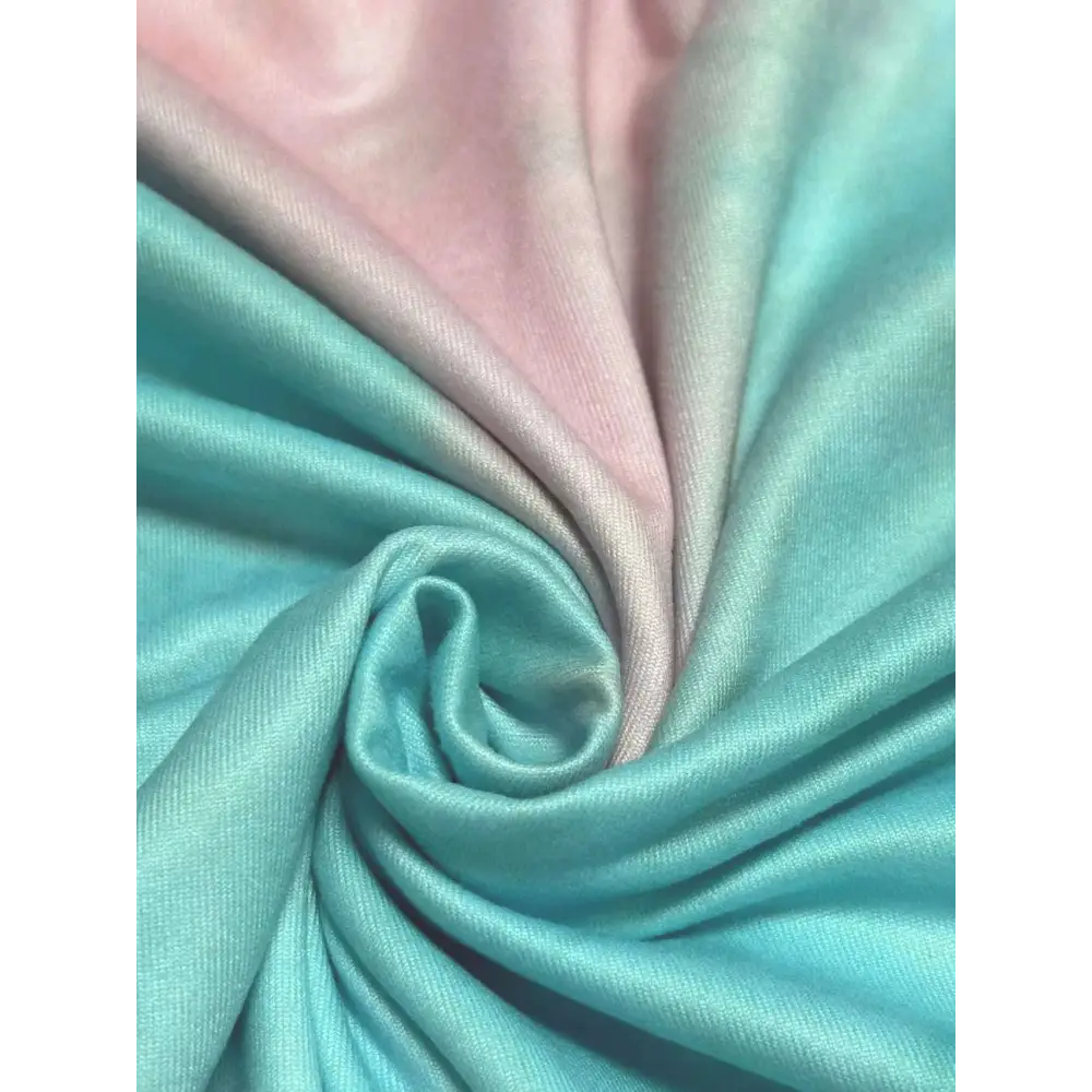 Soft fabric swirl showcasing the New Plus Size European and American Women's Casual V-neck Printed Pocket T-shirt by YIQIAOHUIC.