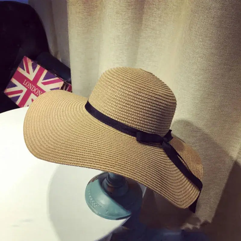 Stylish Summer Women Straw Hat Bowknot Wide Brim Floppy Panama Hats for outdoor beach sun protection by FAITOLAG.