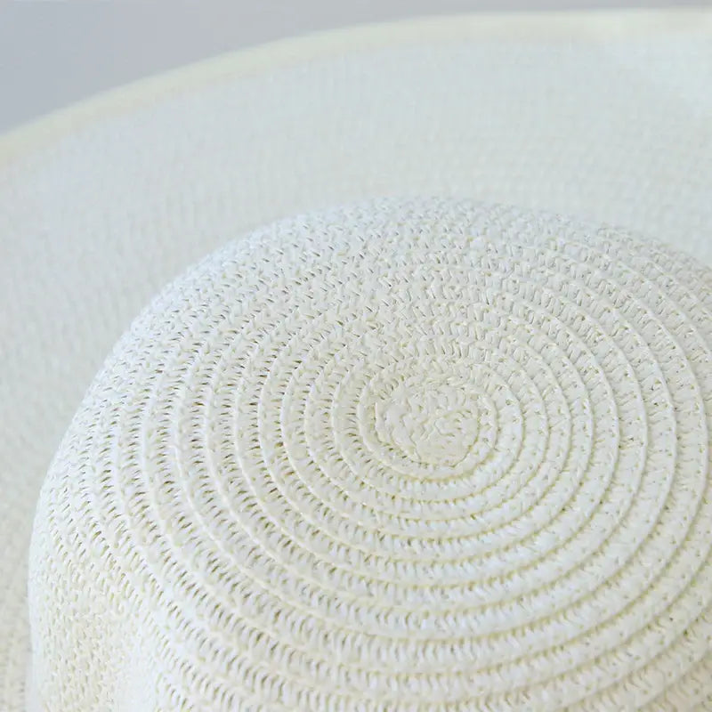 Stylish Summer Women Straw Hat Bowknot Wide Brim Floppy Panama Hats for outdoor fun, perfect for sunny beach days.
