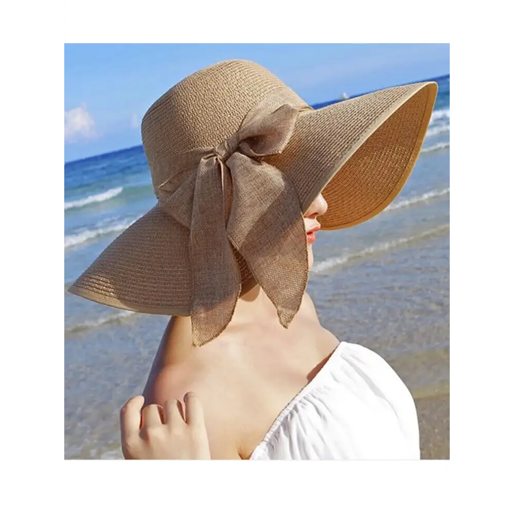 Stylish Summer Women Straw Hat Bowknot Wide Brim Floppy Panama Hats for beach outings, by FAITOLAG. Perfect sun cap!