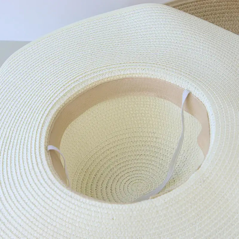 Stylish Summer Women Straw Hat Bowknot Wide Brim Floppy Panama Hats for outdoor beach sun protection by FAITOLAG.