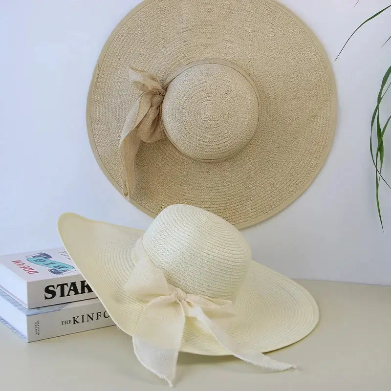Stylish Summer Women Straw Hat Bowknot Wide Brim Floppy Panama Hats for outdoor beach wear by FAITOLAGIC.