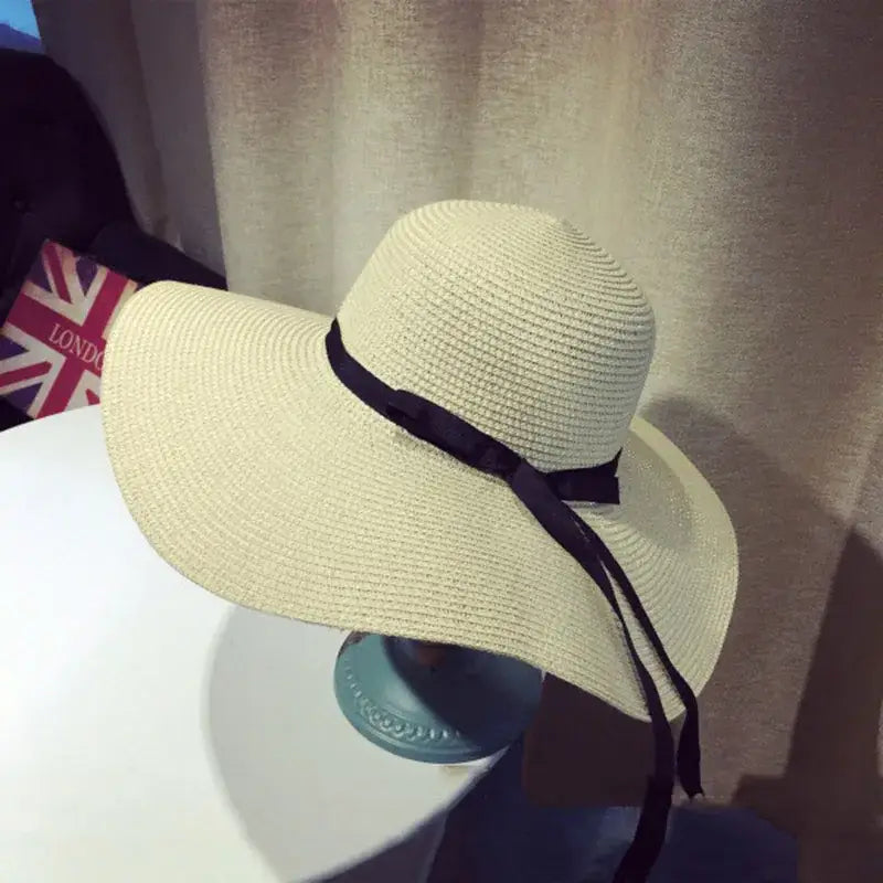 Stylish Summer Women Straw Hat Bowknot Wide Brim Floppy Panama Hats for outdoor beach days by FAITOLAGIC.