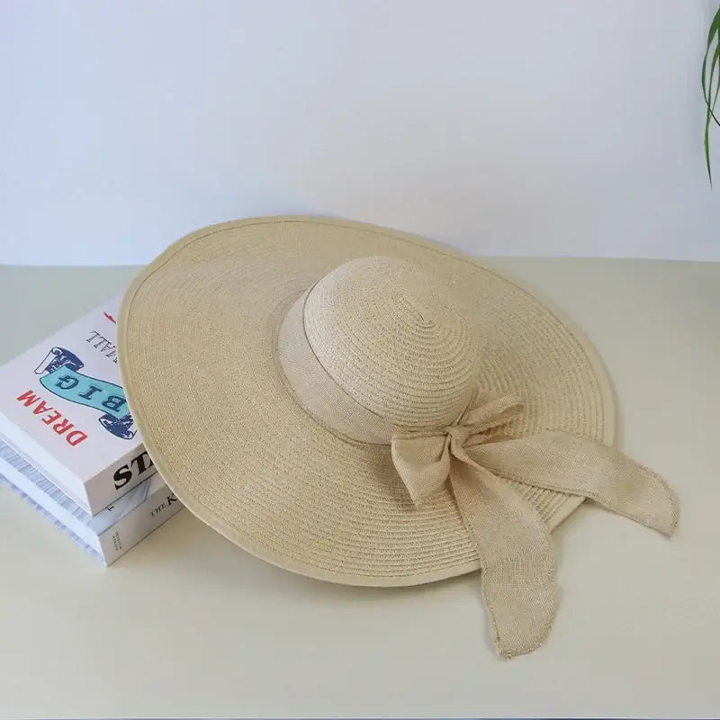 Stylish Summer Women Straw Hat Bowknot Wide Brim Floppy Panama Hats for outdoor beach fun and sun protection by FAITOLAG.