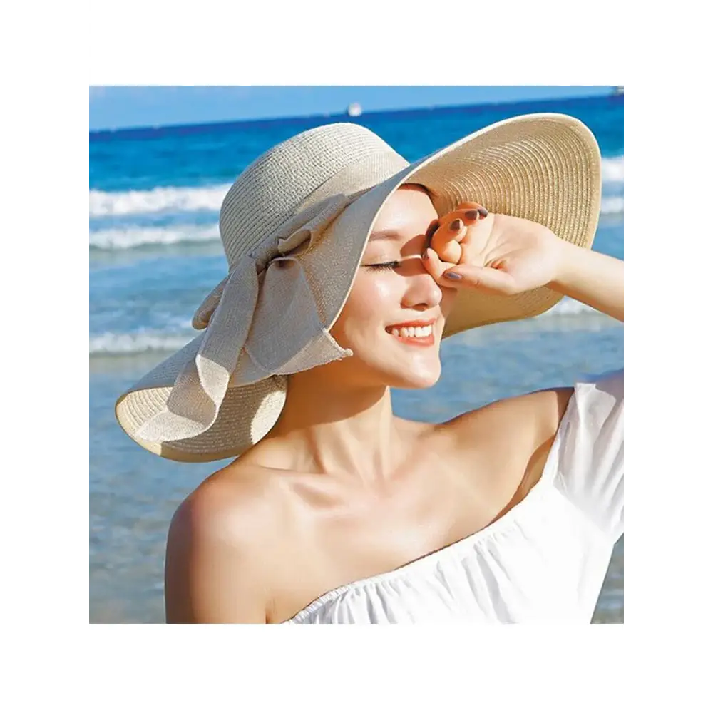 Stylish Summer Women Straw Hat Bowknot Wide Brim Floppy Panama Hats for outdoor beach fun by FAITOLAGI.